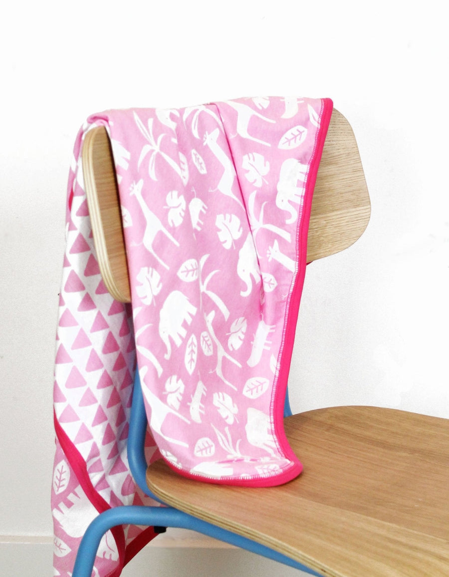 Premium Organic Cotton Baby Blanket for Sleeping, Cuddling, and Relaxation - Soft Two-Sided Design with Jungle Print and Triangles by Toby Tiger at brixbailey.com