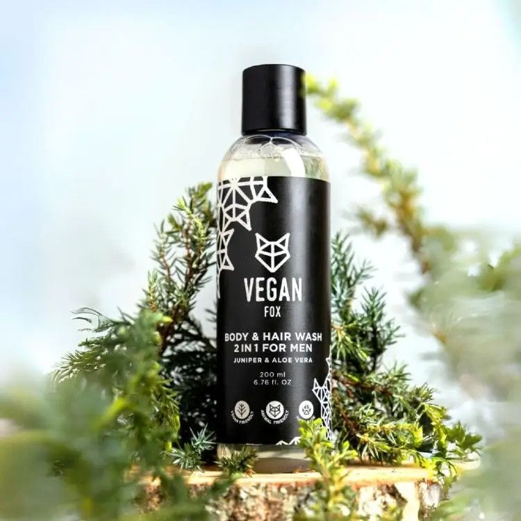 a soft-lit bottle of vegan 2-in-1 body and hair wash for men with natural ingredients