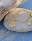 Cygnus Coin Charm Bracelet: Cubic Zirconia