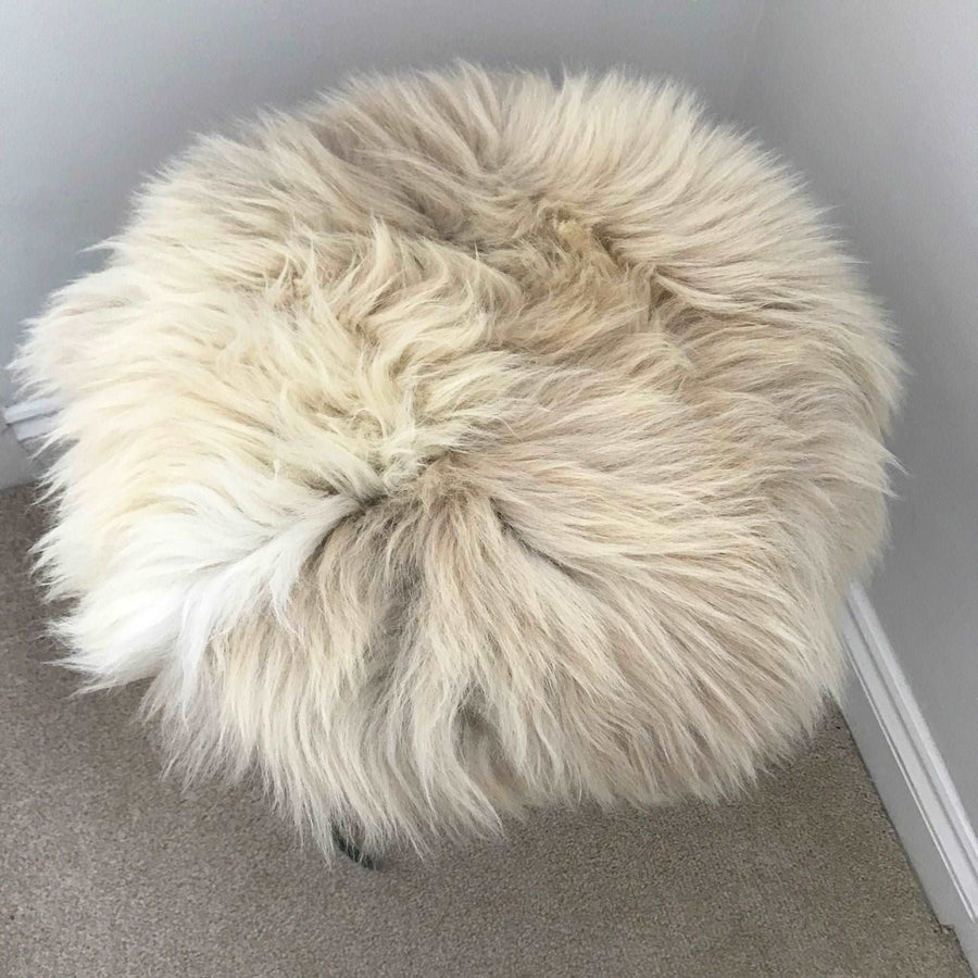 Premium 35cm round sheepskin seat pad, luxury British rare breed natural melange, handcrafted sustainable comfort, stylish home decor by Wildash London at brixbailey.com