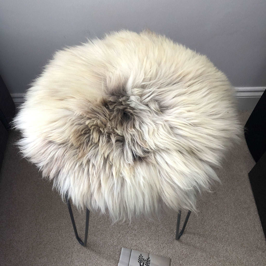 Premium 35cm round sheepskin seat pad, luxury British rare breed natural melange, handcrafted sustainable comfort by Wildash London at brixbailey.com
