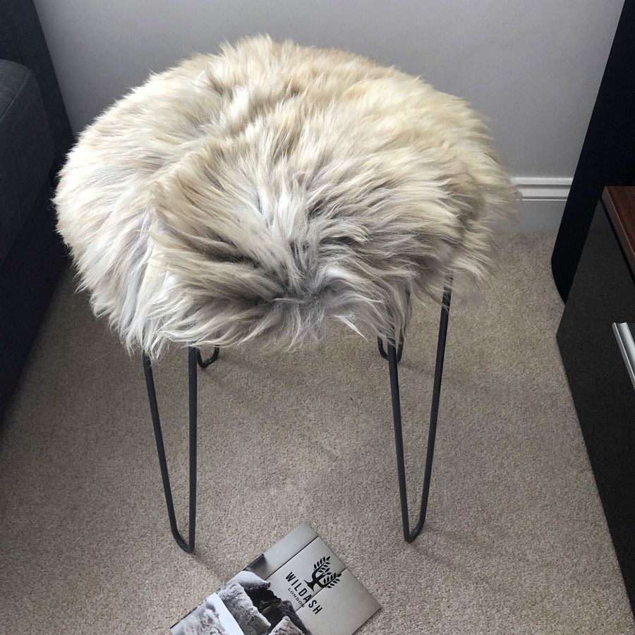 Premium 35cm round sheepskin seat pad, luxury British rare breed natural melange, handcrafted sustainable comfort, soft insulating breathable by Wildash London at brixbailey.com