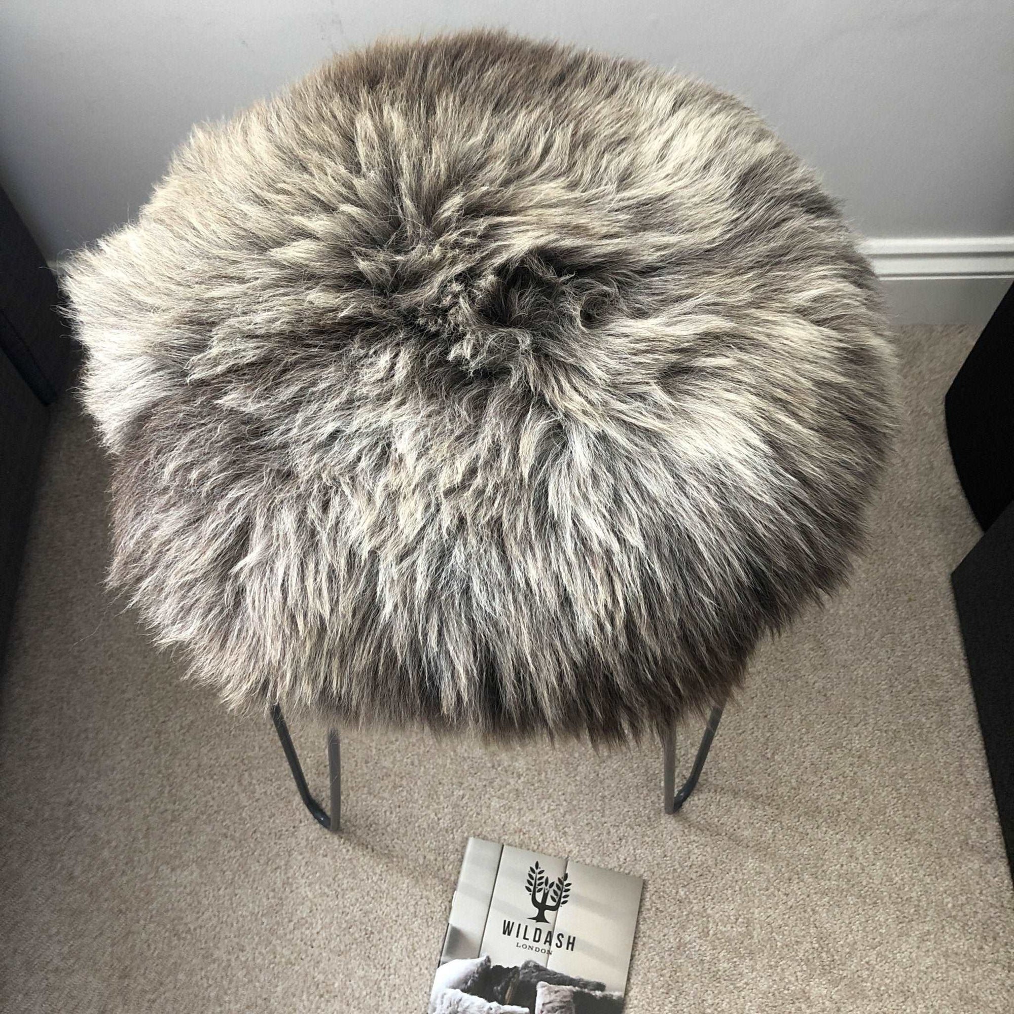 Premium 35cm round sheepskin seat pad, luxury British rare breed, natural melange, sustainable handcrafted comfort, stylish home decor by Wildash London at brixbailey.com