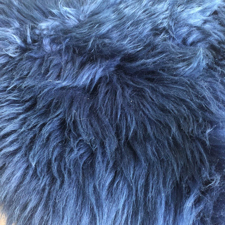 Premium Icelandic Sheepskin Rug in Rich Navy Blue, luxury fleece throw, stylish Scandi decor, handcrafted sustainable sheepskin by Wildash London at brixbailey.com
