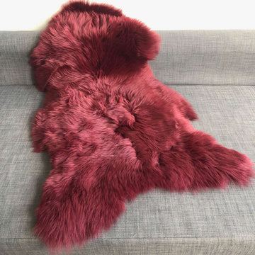 Premium British sheepskin rug, luxury fleece throw, rich Bordeaux red, large ethically sourced organic free-range sheepskin by Wildash London at brixbailey.com