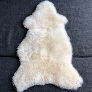 Luxury premium white sheepskin rug, full hide with soft long superwhite fur, natural ivory tone, medium size, machine washable by Wildash London at brixbailey.com