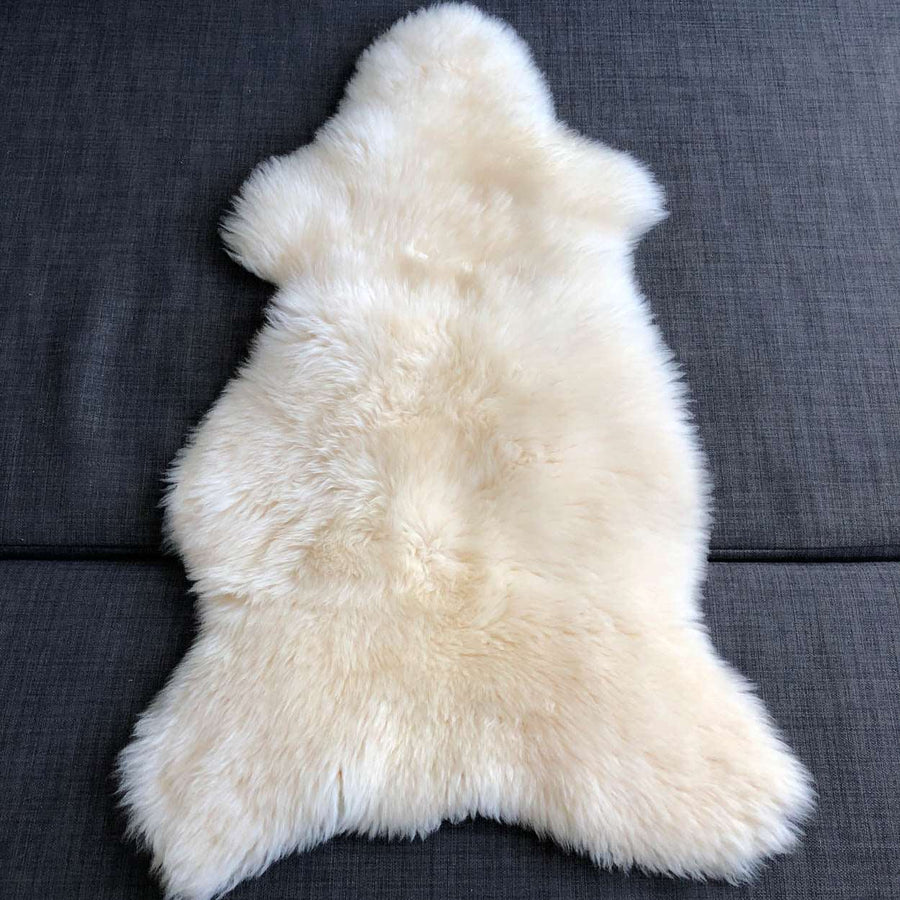 Luxury premium white sheepskin rug, full hide with soft long superwhite fur, natural ivory tone, medium size, machine washable by Wildash London at brixbailey.com