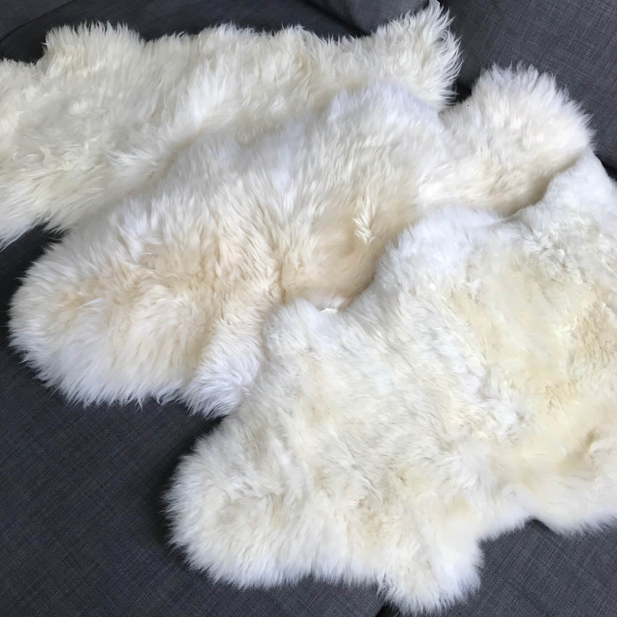 Luxury premium white sheepskin rug, soft long fur, handcrafted natural ivory hide, medium size, machine washable, best-selling home decor by Wildash London at brixbailey.com