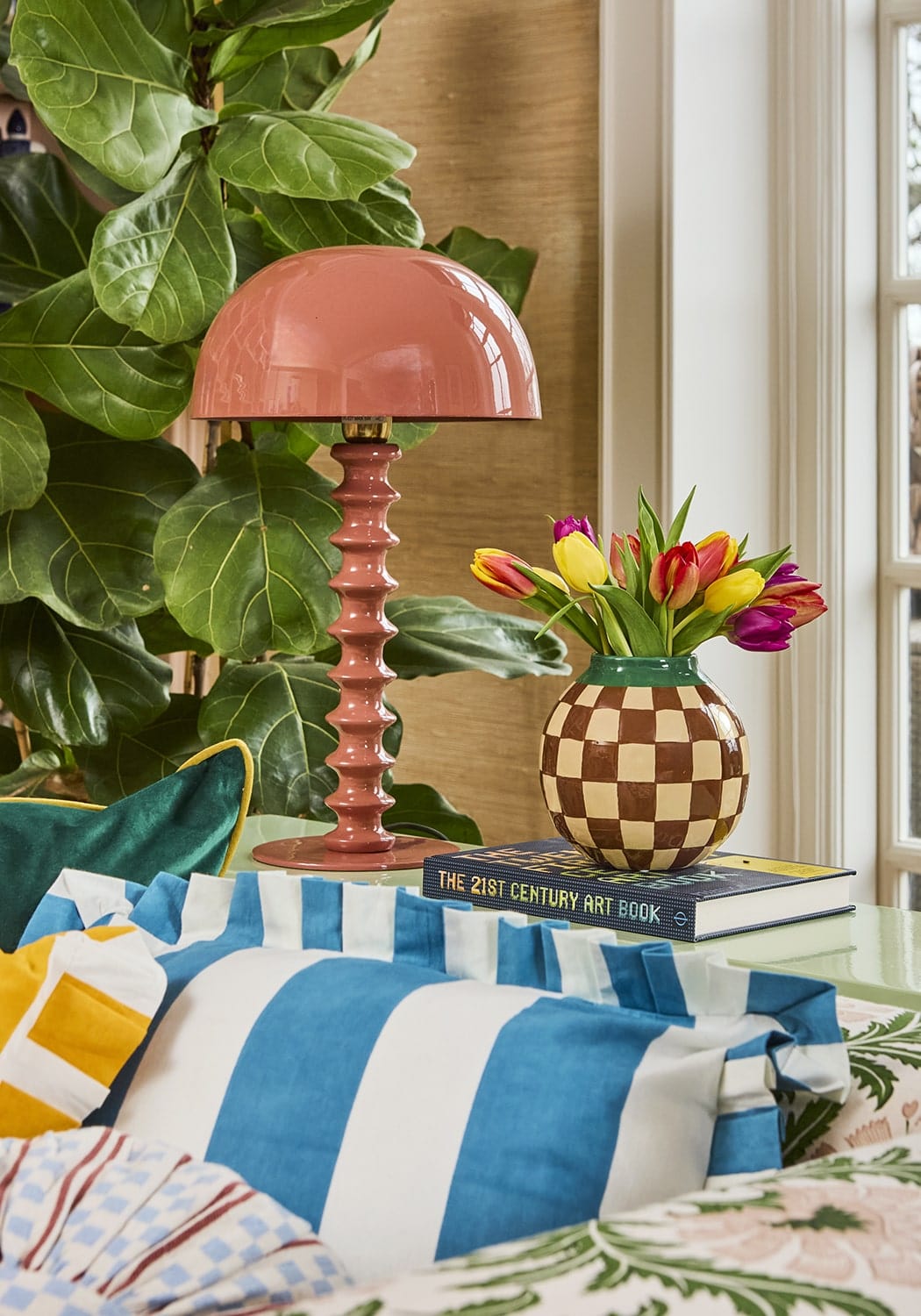 Striped floor lamp in a colourful living room, from independent brands at Brix + Bailey.