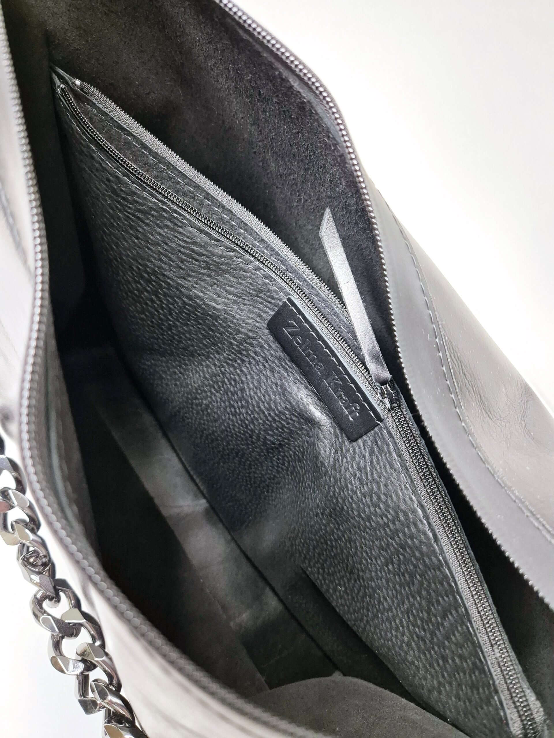 Black Leather Handbag with Metallic Accents, Crossbody