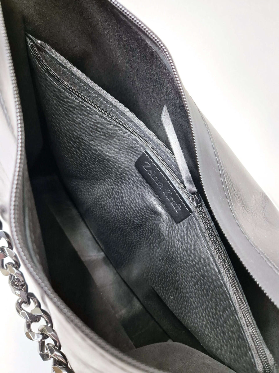 Black Leather Handbag with Metallic Accents, Crossbody