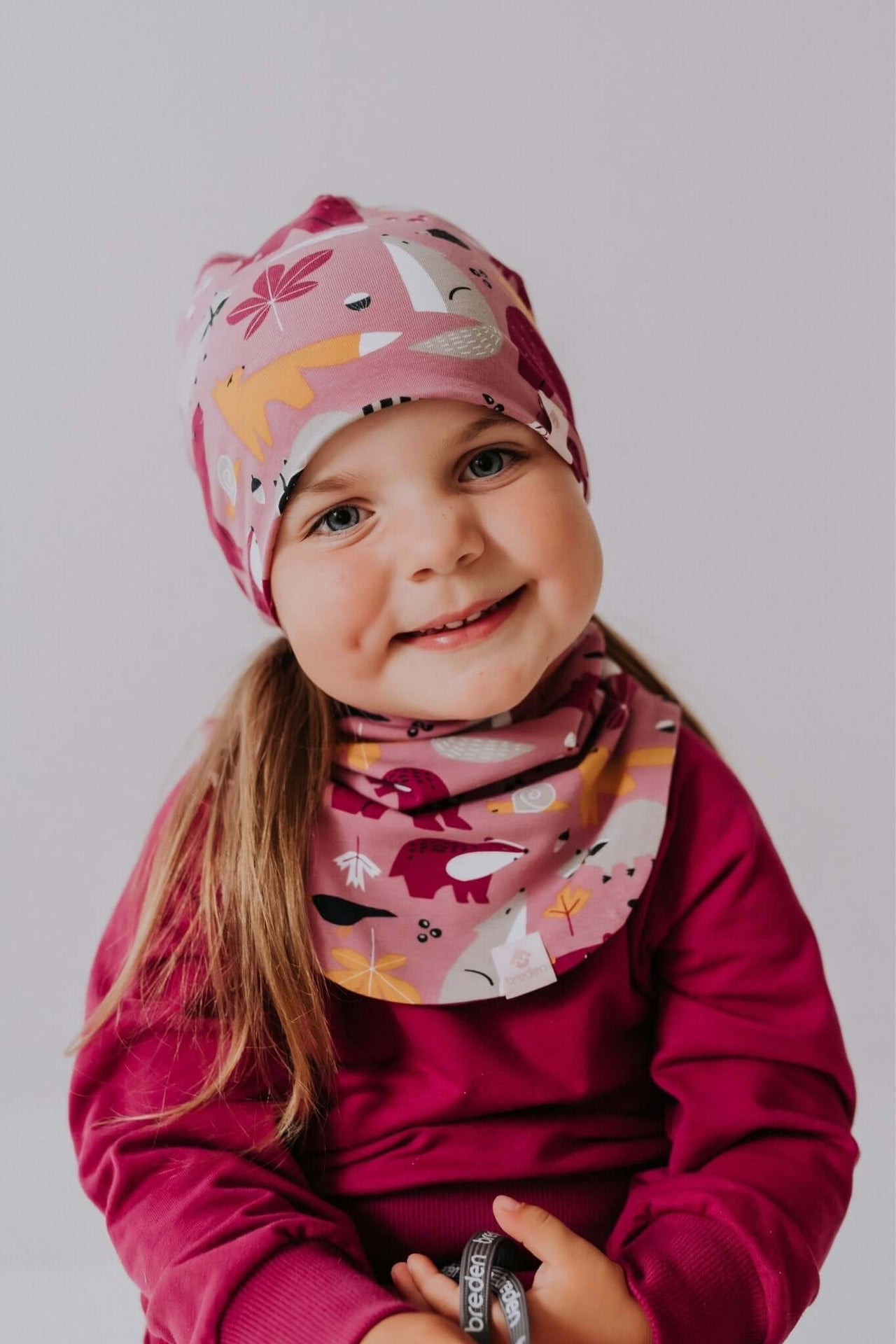 a soft cotton beanie for a child, shown in gentle morning light for a cozy and comforting feel