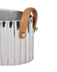 Silver champagne cooler with fluted design, leather handles, and mirror-polished finish for elegant entertaining by RoomLondon at brixbailey.com