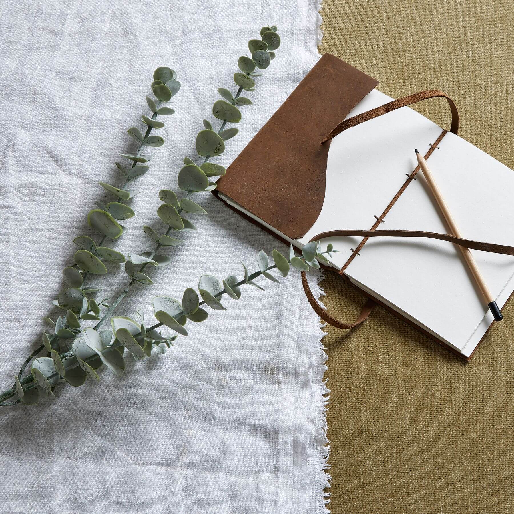 Lifelike blue eucalyptus spray with silver-blue foliage, perfect for vases or centerpieces, 90cm tall, high-quality plastic  by Sostter at brixbailey.com