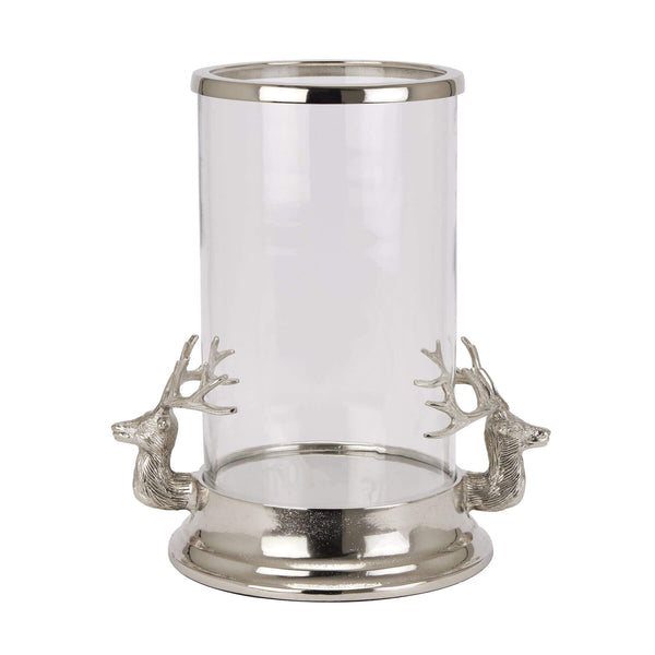 Silver Stag Heads Hurricane Lantern with glass cylinder, polished metal finish, and intricate stag accents for home decor by Sostter at brixbailey.com