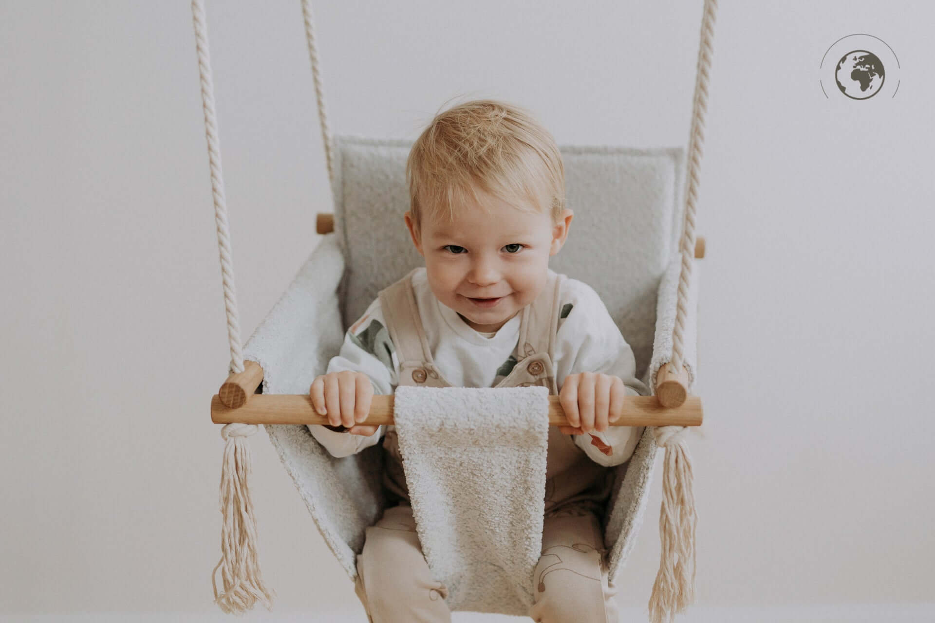 Sustainable Bouclé Baby Swing – Comfort &amp; Nordic Style by Nofi KIDS at www.brixbailey.com