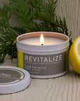 Revitalize luxury soy candle with torn mint leaves, lemon slices, and icy oolong tea scent, handcrafted in Illinois by Labyrinth Made Goods at brixbailey.com