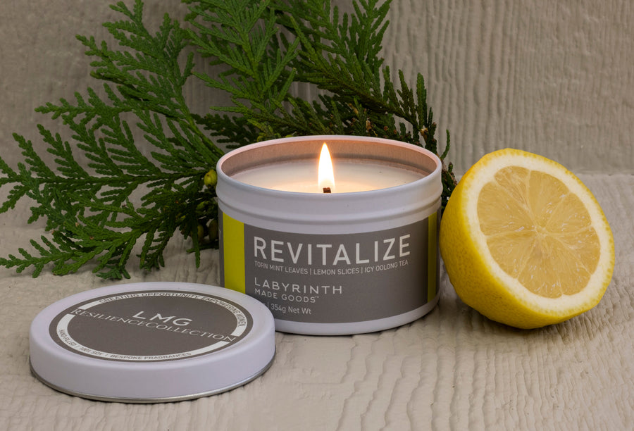 Revitalize luxury soy candle with torn mint leaves, lemon slices, and icy oolong tea scent, handcrafted in Illinois by Labyrinth Made Goods at brixbailey.com