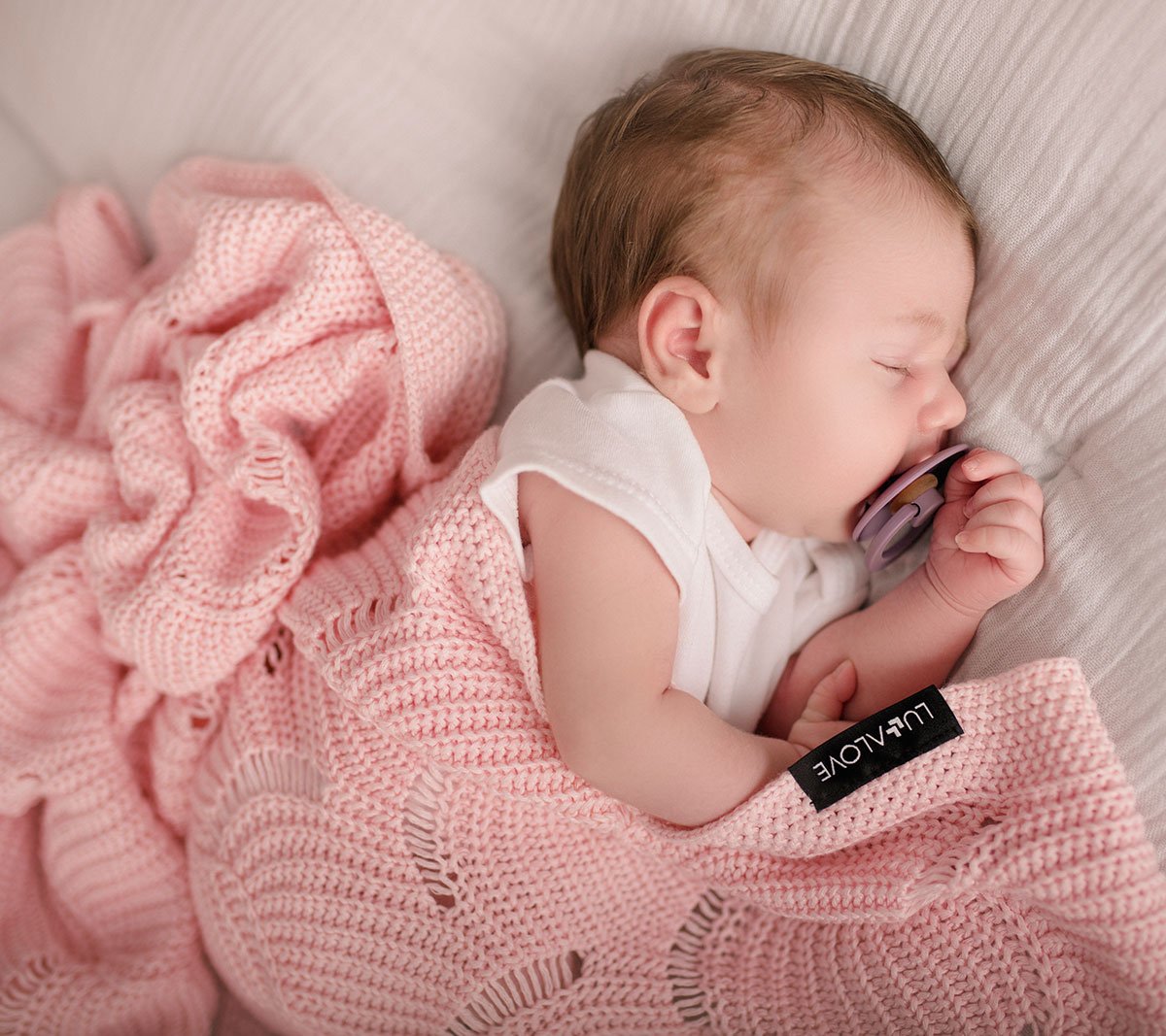 Rose Quartz Seashell Cellular Bamboo Baby Blanket - Hypoallergenic, Soft & Eco-Friendly 80x100 cm by Lullalove UK at brixbailey.com