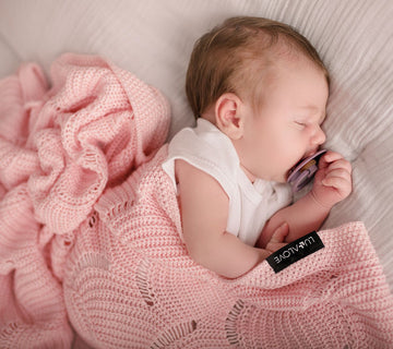 Rose Quartz Seashell Cellular Bamboo Baby Blanket - Hypoallergenic, Soft & Eco-Friendly 80x100 cm by Lullalove UK at brixbailey.com