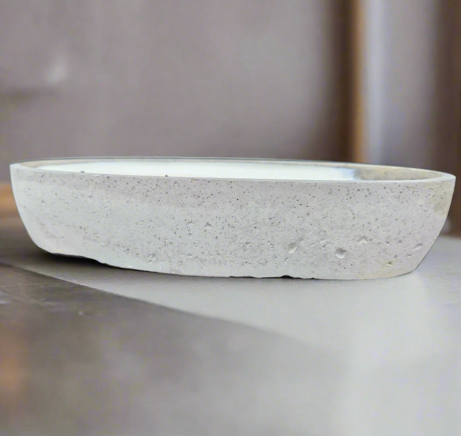 Luxury multi wick concrete loaf bowl candle, stylish modern design with premium long-lasting fragrance, best-selling statement piece by Ralph's Orchard at brixbailey.com