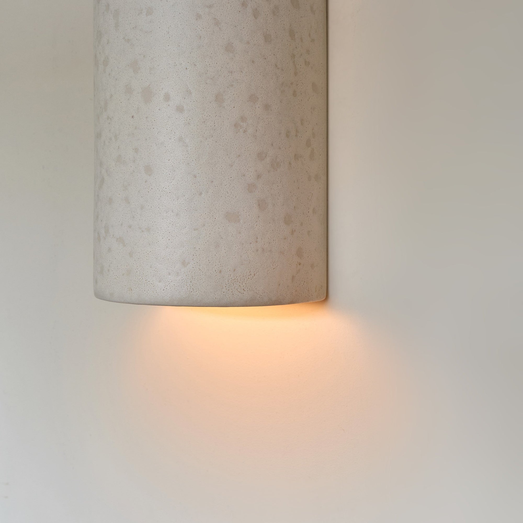 Handcrafted Ceramic Wall Light in Raw White Curve
