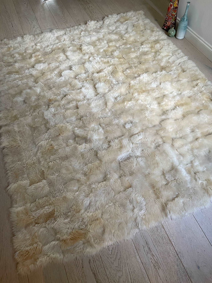 Luxury champagne Tuscan shearling throw rug, ultra-dense fur, super soft, handcrafted, best-selling, stylish home decor by Wildash London at brixbailey.com