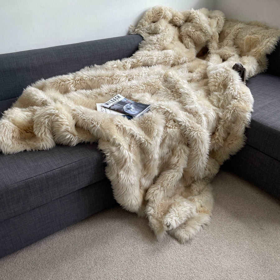 Luxury champagne Tuscan shearling throw rug, ultra-dense fur, premium handcrafted, best-selling home decor, stylish and warm by Wildash London at brixbailey.com