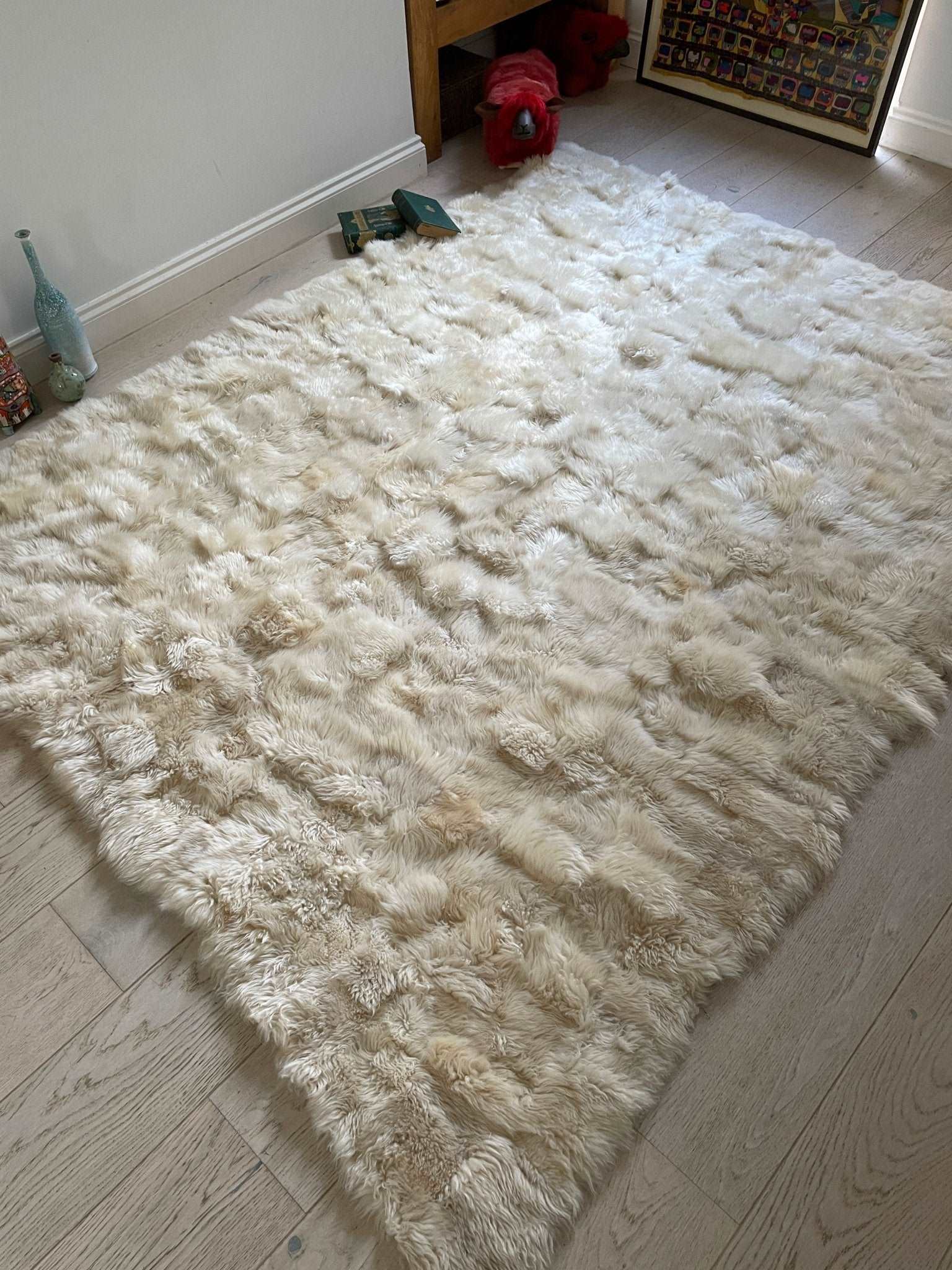 Luxury champagne Tuscan shearling throw rug, ultra-dense soft fur, handcrafted premium home decor, best-selling stylish accent piece by Wildash London at brixbailey.com