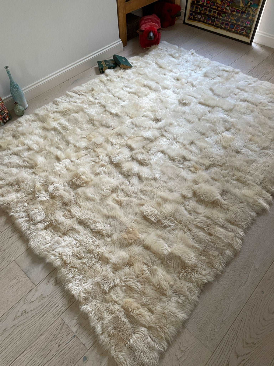 Luxury champagne Tuscan shearling throw rug, ultra-dense soft fur, handcrafted premium home decor, best-selling stylish accent piece by Wildash London at brixbailey.com