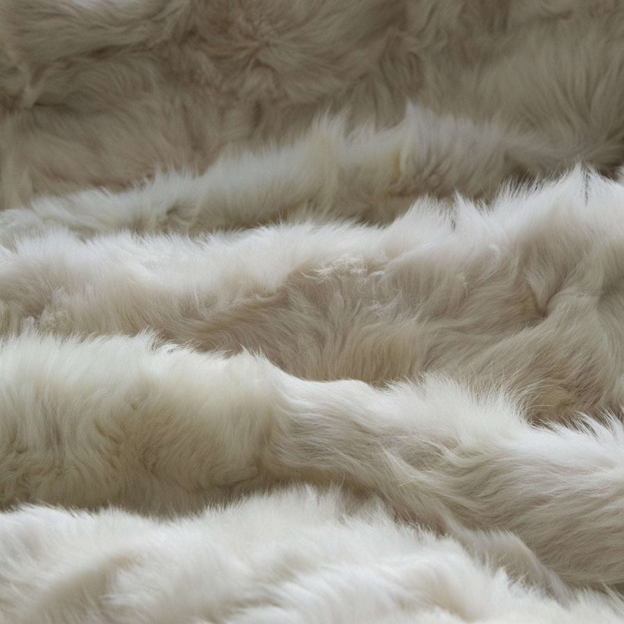 Luxury champagne Tuscan shearling throw, premium handcrafted rug, unique natural texture, stylish home decor, best-selling warm throw by Wildash London at brixbailey.com