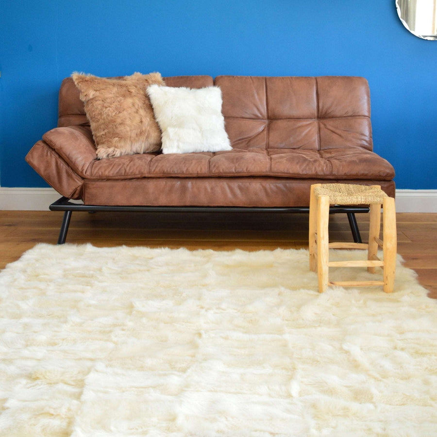 Luxury champagne Tuscan shearling throw rug, premium handcrafted unique piece, stylish bed or sofa decor, best-selling warm textured home accent by Wildash London at brixbailey.com