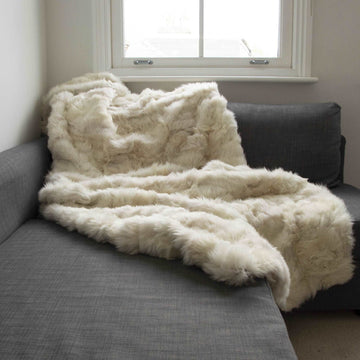 Luxury champagne Tuscan shearling throw rug, premium handcrafted unique design for bed or sofa, best-selling warm textured home decor by Wildash London at brixbailey.com