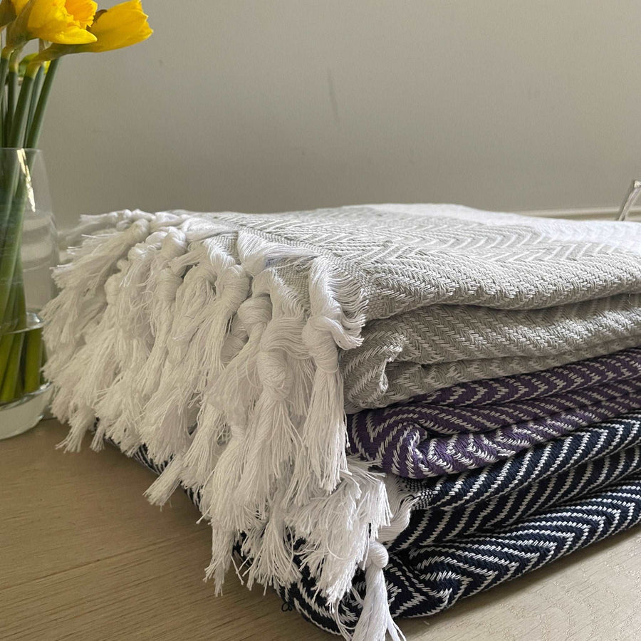 Luxury deep purple chevron organic cotton throw, handloomed oversized blanket, premium soft heavy weight, stylish zigzag pattern, best-selling home decor by Wildash London at brixbailey.com