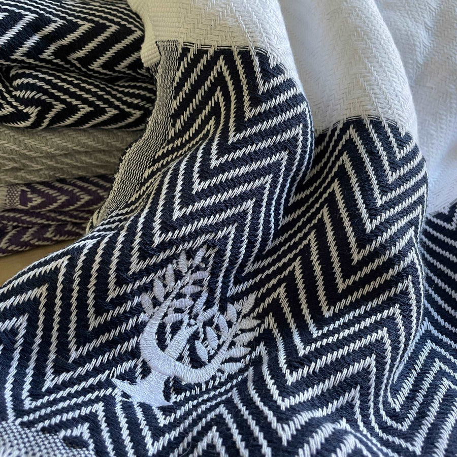 Luxury handloomed organic cotton chevron throw, navy blue, oversized 200x250cm, premium heavyweight, soft texture, stylish zigzag pattern by Wildash London at brixbailey.com