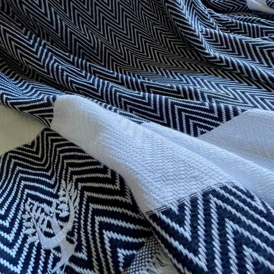 Luxury handloomed organic cotton chevron throw, navy blue, oversized 200x250cm, premium heavyweight, stylish zigzag pattern, best-selling home decor by Wildash London at brixbailey.com