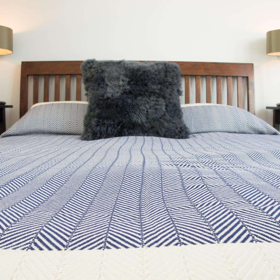 Chevron organic cotton handloomed throw, navy blue luxury oversized blanket, premium soft heavy weight bedspread, stylish zigzag pattern by Wildash London at brixbailey.com