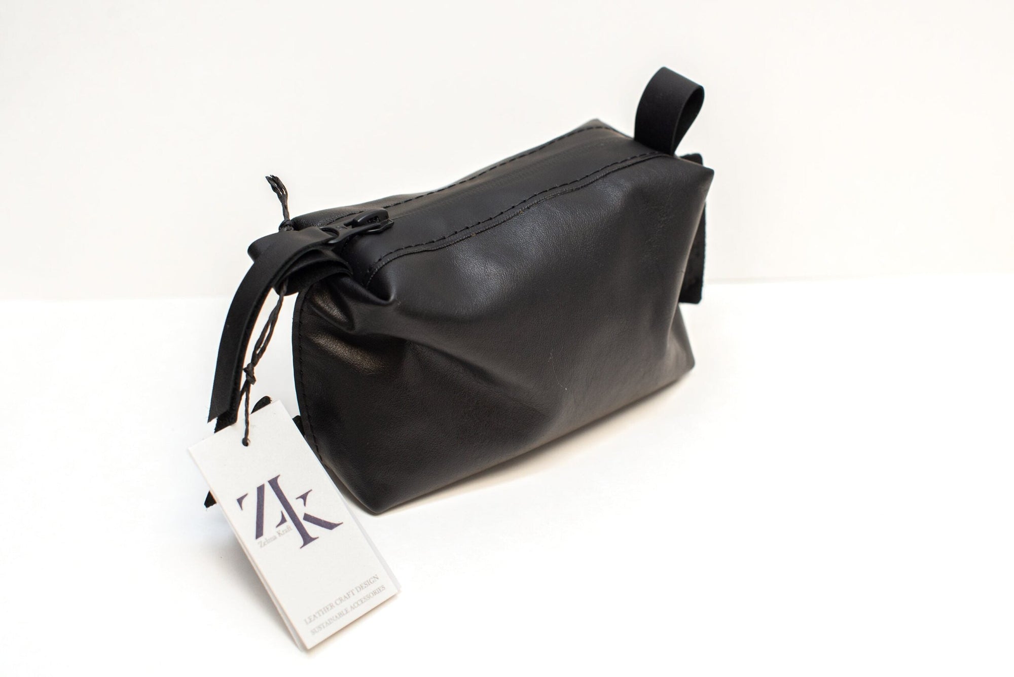 Handmade Leather Cosmetic Bag – Durable & Stylish Organizer by Zelma Kraft at brixbailey.com