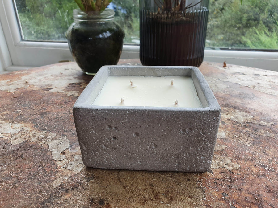 Luxury concrete container candle in minimalist design, modern scents like vintage bookshop, zen, enchanted forest, amber rock salt, vegan eco-friendly by Ralph's Orchard at brixbailey.com