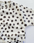 Long Sleeved Baby Bib - Spotty print