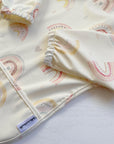 Long Sleeved Baby Bib - Rainbow print
