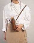 Leather Water Bottle Holder with Glass Bottle and Adjustable Strap