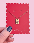 Custom engraved tiny tag necklace