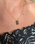 Custom engraved tiny tag necklace