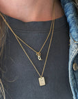 Custom engraved tiny tag necklace