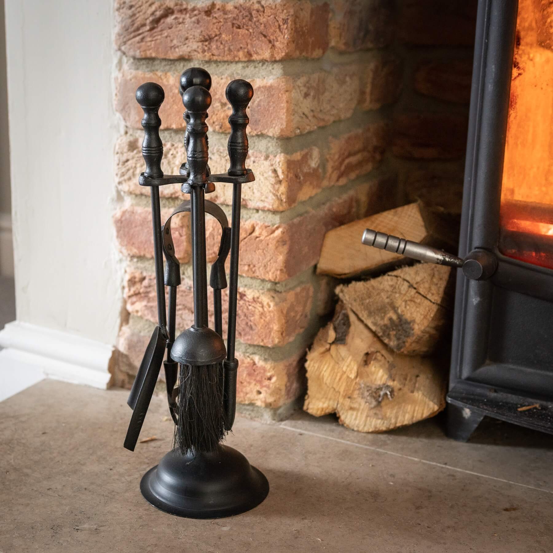 Black Duchess fireplace set with ornate steel detailing, matte finish, and regal design for traditional or modern decor. by Sostter at brixbailey.com