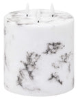 Marble-effect three-wick LED candle with amber flickering lights, elegant white decorative centerpiece by Sostter at brixbailey.com