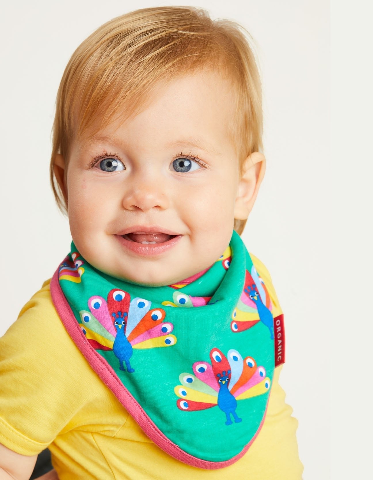 Premium Peacock Print Organic Cotton Baby Bib with Snap Buttons, Absorbent and Eco-Friendly for Mess-Free Feeding by Toby Tiger at brixbailey.com