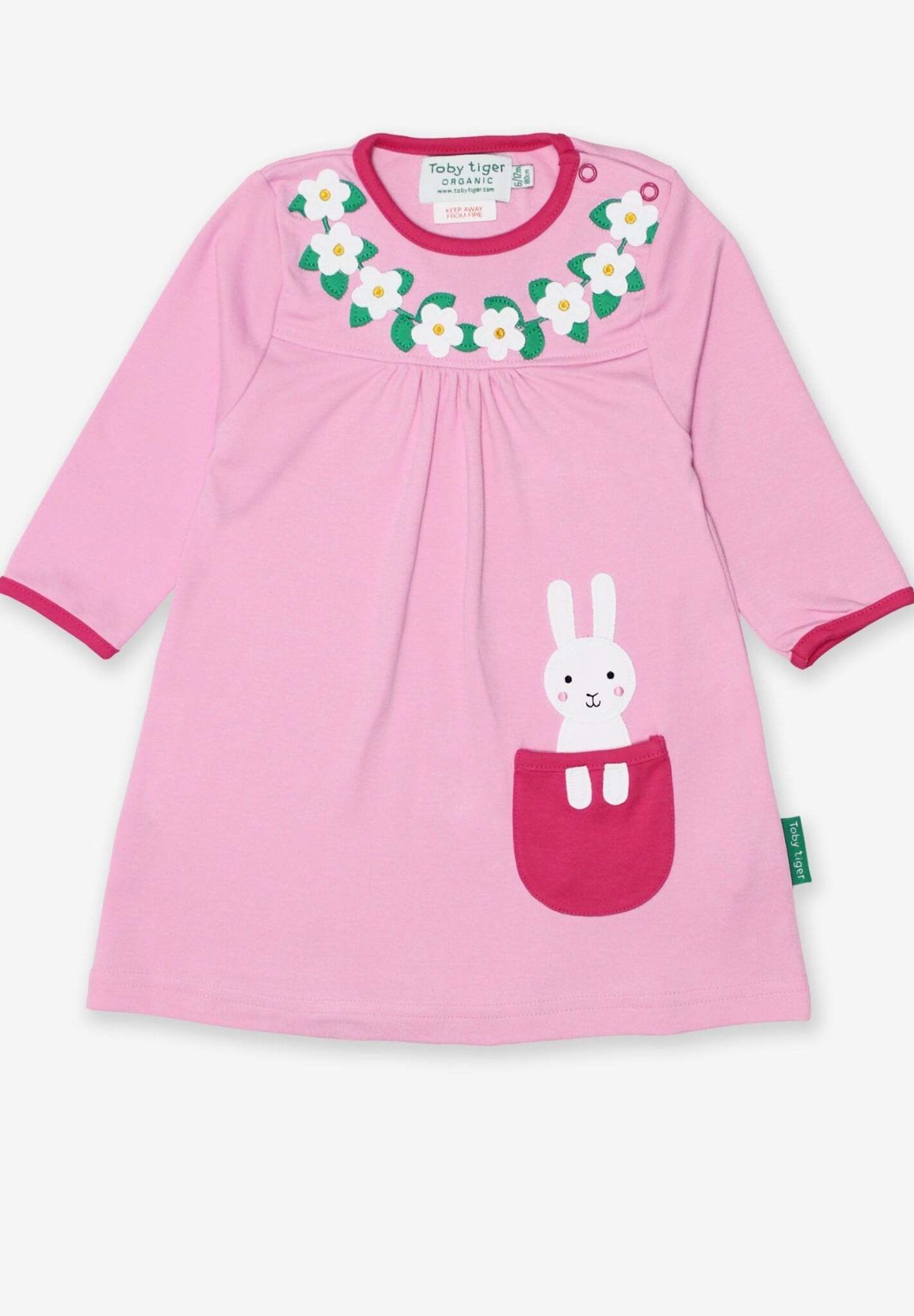 Premium baby girl floral daisy dress with bunny applique, playful pocket detail, snap button shoulders, sizes 6-24 months, organic cotton spring outfit by Toby Tiger at brixbailey.com