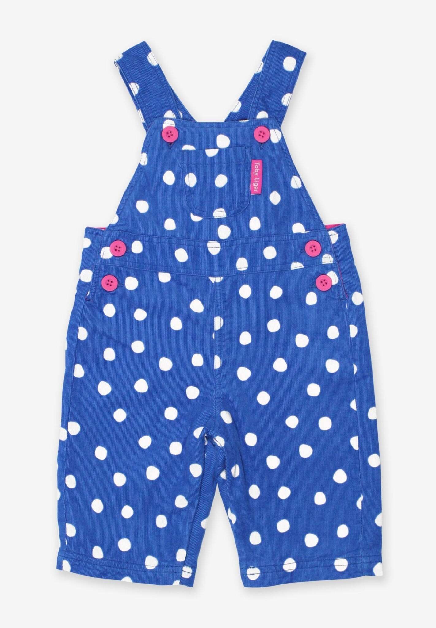 Premium organic cotton pinafore overalls, stylish polka dot baby romper with pink buttons, soft jersey lining, adjustable straps, easy diaper change by Toby Tiger at brixbailey.com